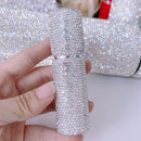 Front view of SUUMEE refillable perfume atomizer bottle on white background