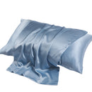 Lifestyle view of the silk pillowcase styled on a bed for a refined bedroom look