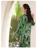 Folded silk suit set highlighting the oasis print fabric texture