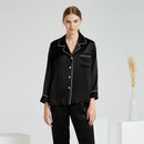Black mulberry silk pajama set with notch lapel on white background