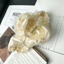 Hair clip held in hand showing size