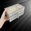 Top-down view highlighting transparent acrylic panels and crystal-accented frame detail