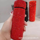 Side profile of red mini stainless steel tumbler showing straight-body silhouette and crystal detailing