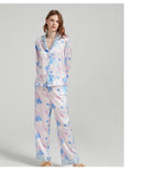 Collar and button detail on the silk pajama shirt