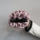 Rose cloud clip styled with braided crown and floral accessories