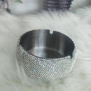 Top-down view of ashtray interior showing recessed smoking area and raised rim