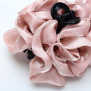 Rose cloud clip styled with beachy waves and sunlit hair