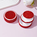 Lifestyle image of snus storage box placed next to common snus tins and a leather wallet