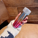 Tumbler placed in standard car cup holder demonstrating perfect fit