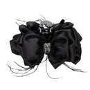 Hair clip styled on a low chignon hairstyle, demonstrating secure placement and elegant proportion