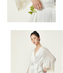 Close-up of V-neckline and lace trim on silk robe