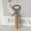 Hand holding opener demonstrating comfortable grip and compact scale