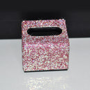 Soft-shadow studio shot highlighting reflective facets and elegant proportions