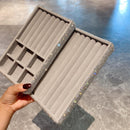 Foam tray removal demonstration: hand lifting 18-compartment insert