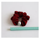 Packaging-ready display of hair ties in minimalist matte box