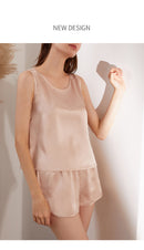 Light apricot silk tank top and shorts two-piece set lifestyle shot
