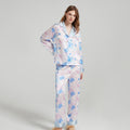 Woman wearing 19mm mulberry silk pajama set with watercolor print, front view