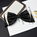 Front view of butterfly bow hair clip with dual-layer satin ribbon on white background