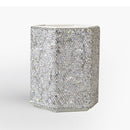 Lifestyle shot: makeup brushes arranged upright in Nordic Pink holder on vanity