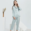 Mint green silk pajama set in full-length cut on standing model
