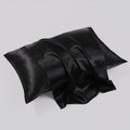 Black 22 momme mulberry silk pillowcase on white background