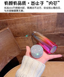 Detail of laser-etched SUUMEE logo on base of tumbler