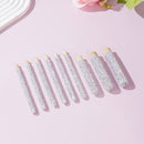 Hand holding a wooden handle with rhinestones — demonstrating ergonomic grip and finish quality