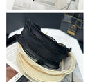 Packaging shot: SUUMEE matte box with hair band nestled inside