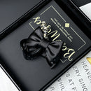 Close-up of hand-set clear crystals on black claw clip base