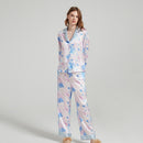 Back view of the silk pajama shirt showing the notched collar and relaxed fit