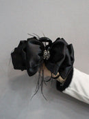 Top-down angle highlighting dimensional bow shape and satin texture clarity