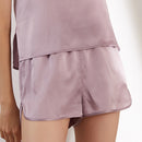 Mauve purple silk loungewear shorts side detail on model