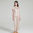 Light apricot silk pajama set featuring button front and long pants
