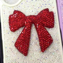 Pink bow rhinestone charm with natural light reflection