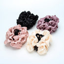 Side angle showing depth and dimension of lavender cloud tulle hair clip