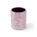 Close-up detail of rhinestone border on red leather desk organizer