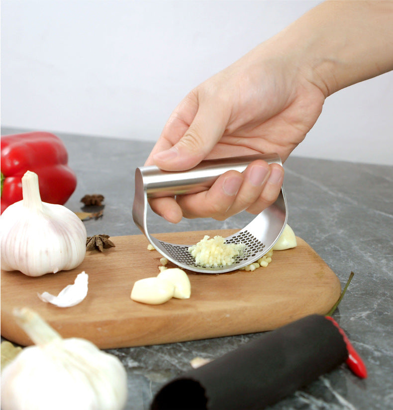 Hand-held Garlic Press